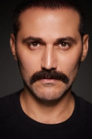 Дженгиз Окуюджу